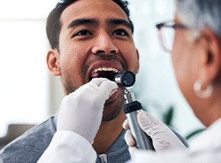 Man having his smile looked at