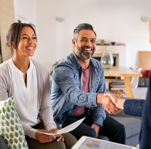 Man and woman meeting with their Hoover dentist