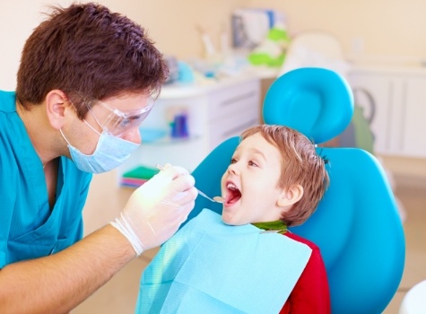 Dentist performing a dental checkup for kids in Hoover