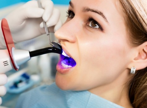 Woman getting cosmetic dental bonding