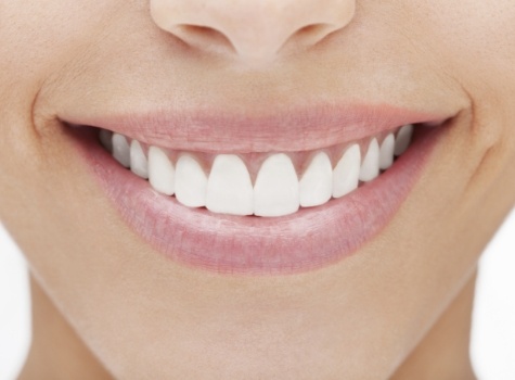 Close up of smile with straight white teeth