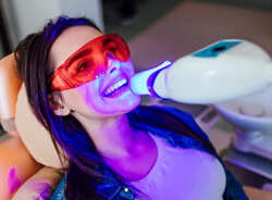 lady receives teeth whitening