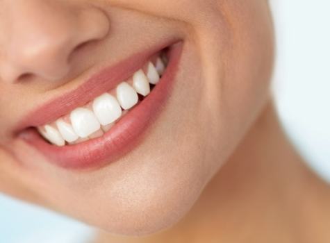 Close up of smile with straight white teeth