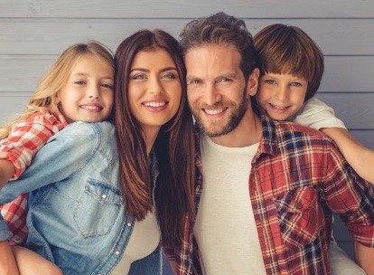 smiling family at the beach