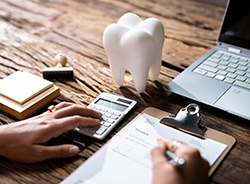 A patient reviewing their dental insurance benefits