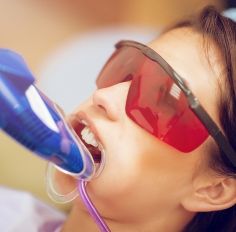 Young girl getting fluoride treatment in Hoover dental office