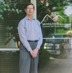 Doctor Moulton standing outside of Hoover dental office