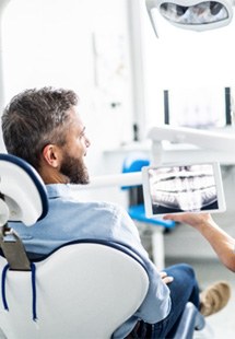 patient talking to dentist 