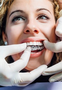 patient smiling while getting Invisalign 