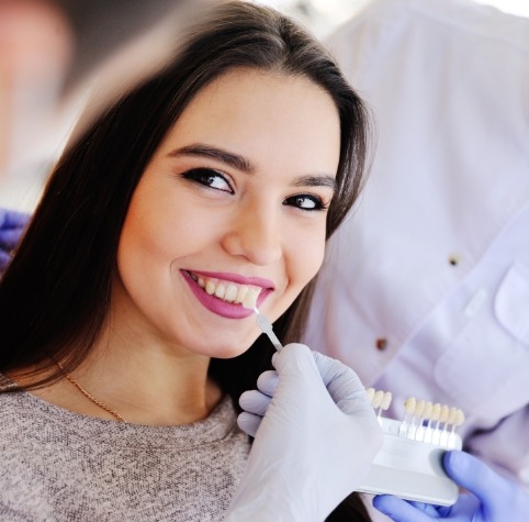 Young woman getting dental veneers in Hoover from cosmetic dentist