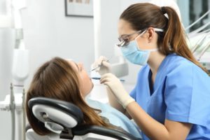 patient getting dental cleaning in Hoover 