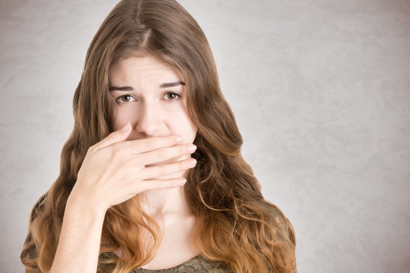 young woman with bad breath