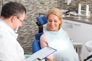 Patient talking to a dentist