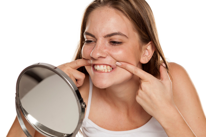 Patient smiling after teeth whitening