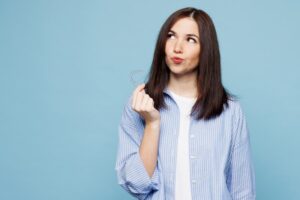 Woman wondering if SureSmile works with her dental restorations